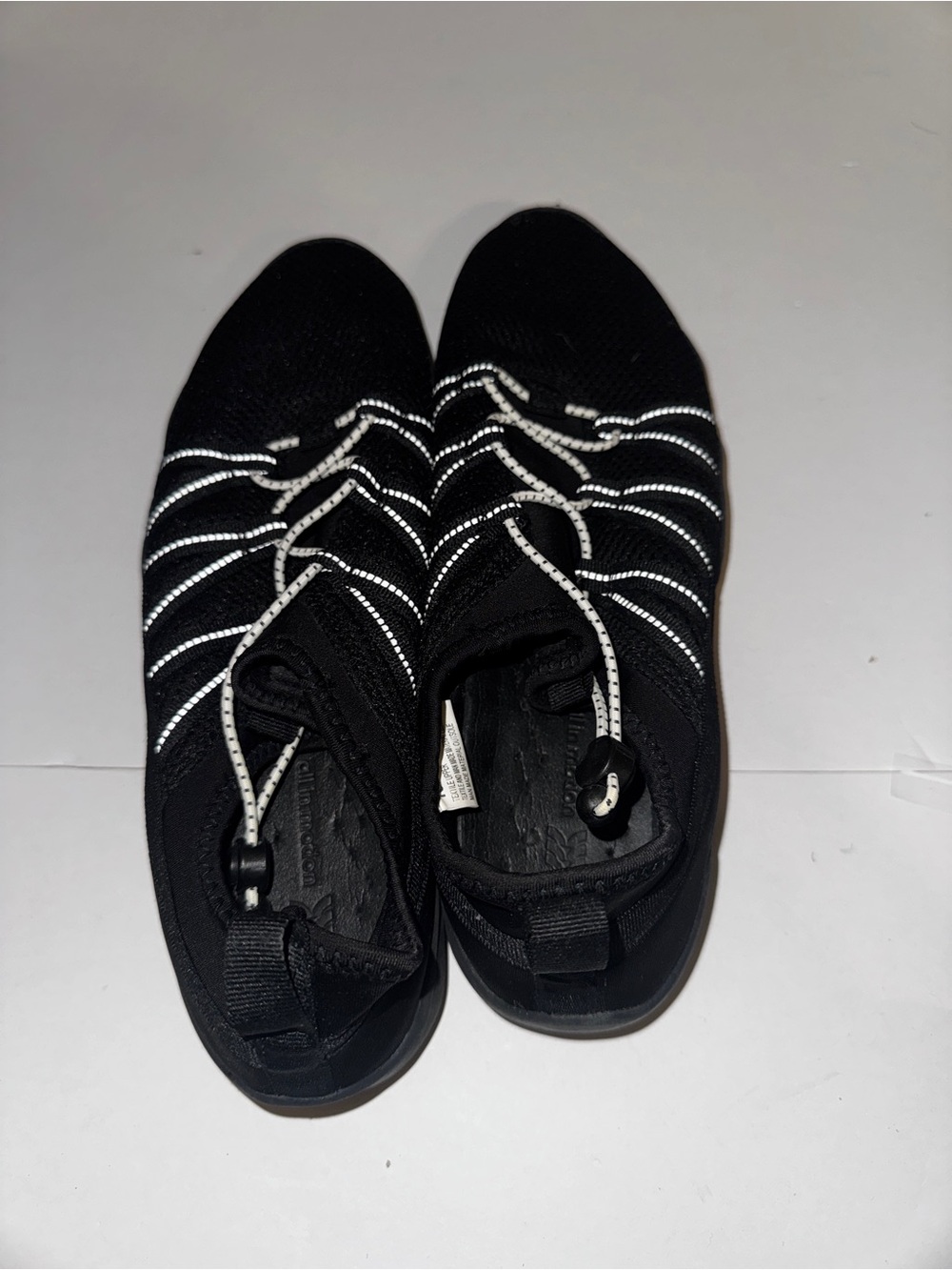 all in motion Black Slip-On Athletic Swin ahoes with Reflective Bungee